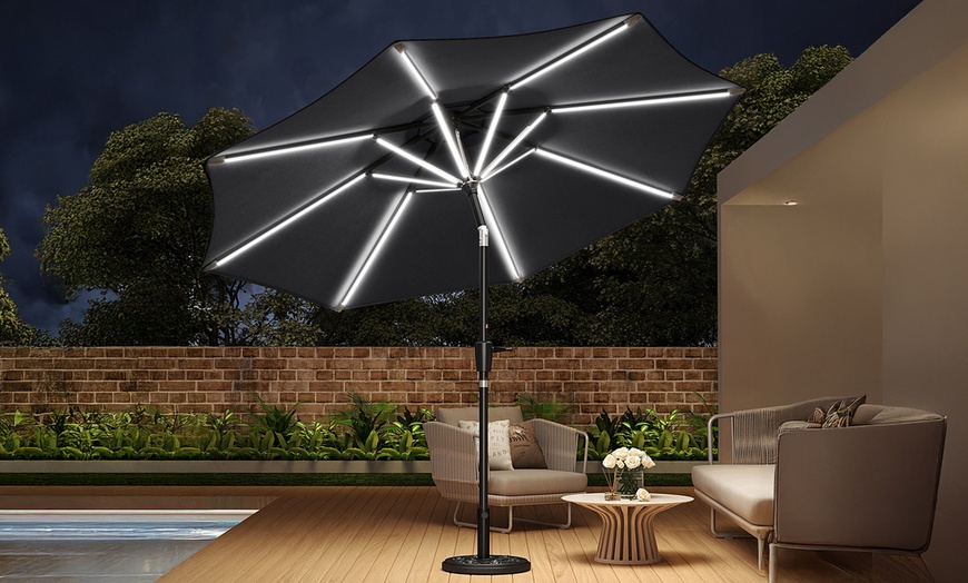 Image 2: Rotatable Solar Strip Lighting Umbrella with Fillable Base