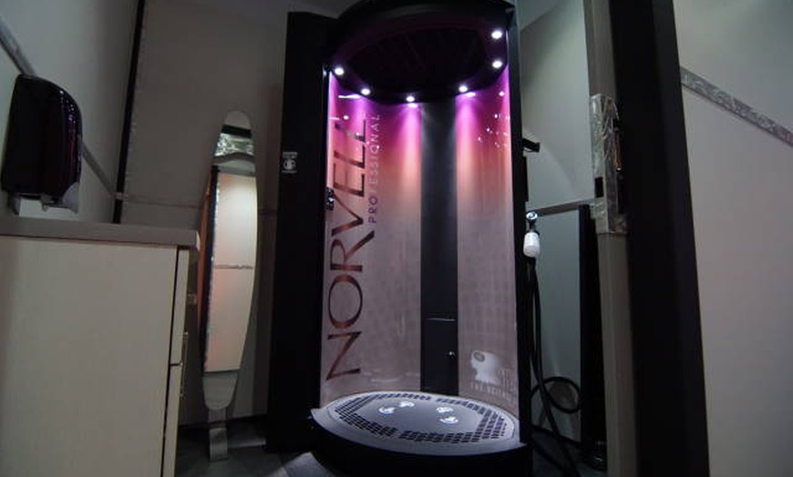 Image 2: Choose from "The Grand Tour" Tanning Bed or VersaSpa Spray Tan