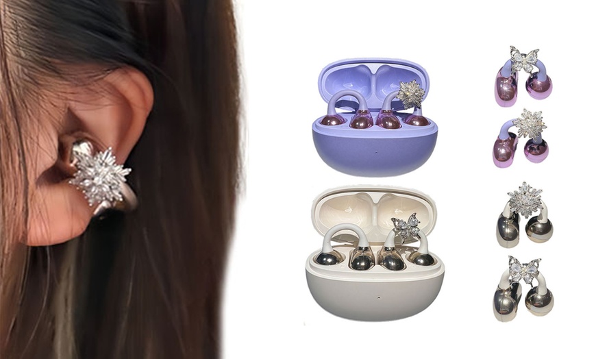 Image 1: Auriculares inalámbricos con diseño de clip y batería duradera