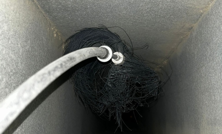 Image 2: Comprehensive Dryer Vent and Chimney Safety Check