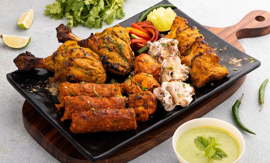 Image 6: Voucher Worth AED 100 or AED 150 to Spend on Anything Off the Menu 