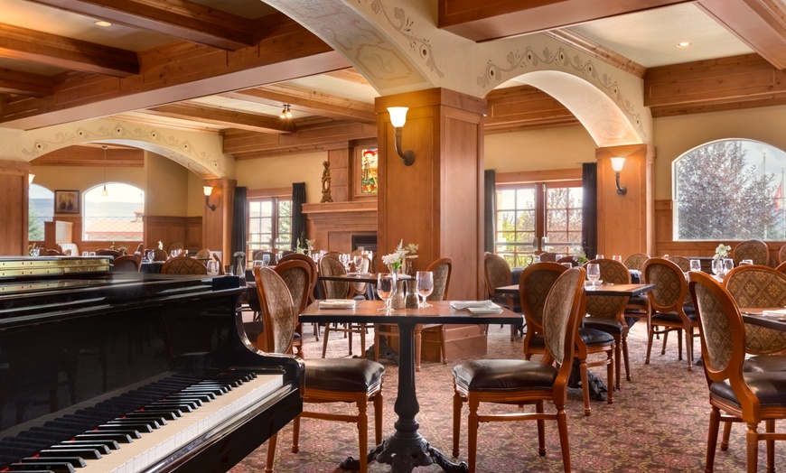 Image 4: Cozy alpine rooms, heated pool, and mountain views