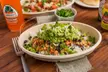 Customizable Burritos, Bowls, or Tacos with Chips, Dip & Drinks for One, Two, or Four People (Up to 36% Off) - Second Medium