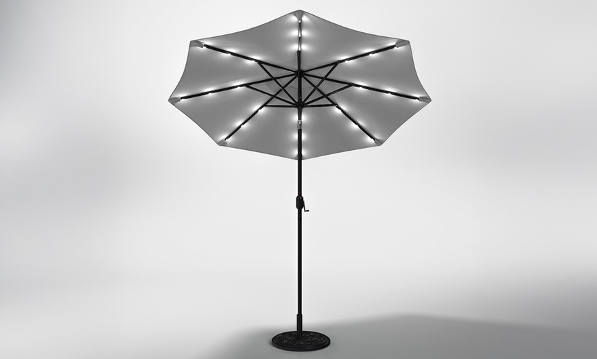 Image 9: Rotatable Solar Lighting Garden Umbrella with Fillable Base