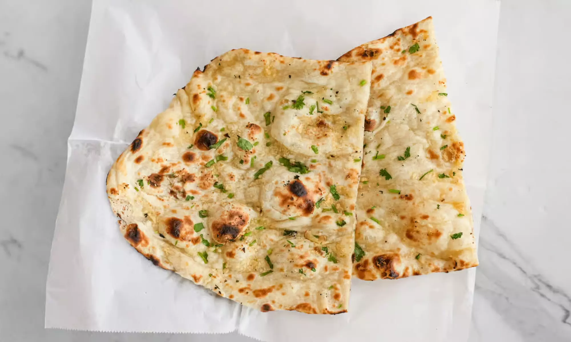 Enjoy $30, $60, or $100 Towards Indian Food and Drinks