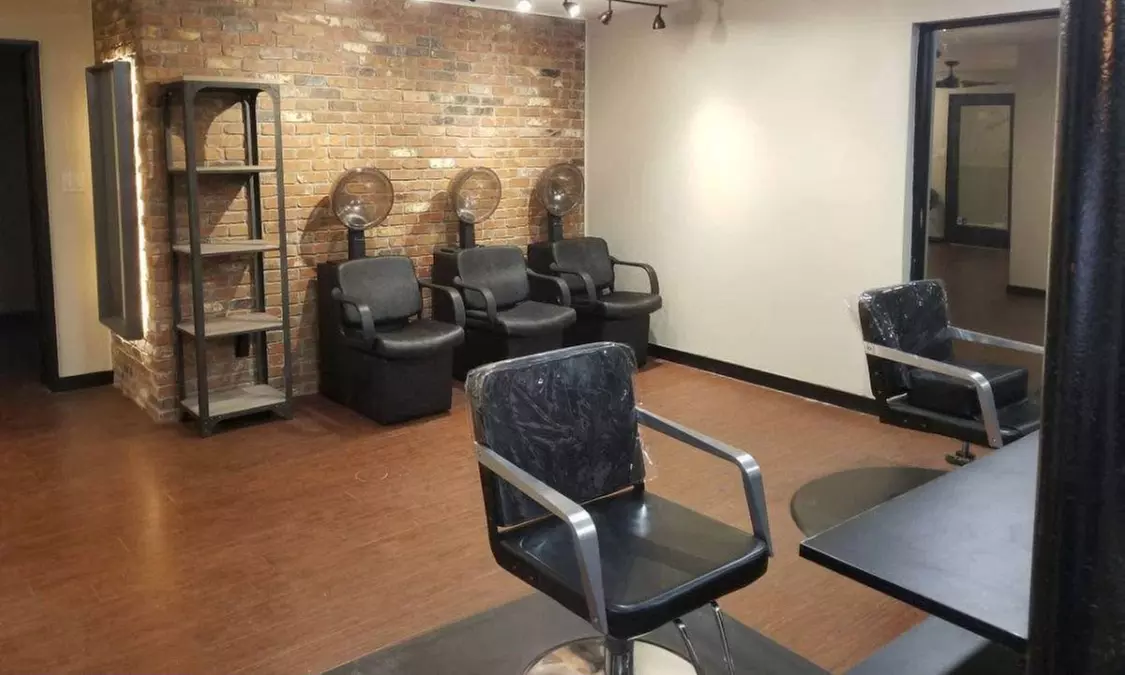 One Women's Haircut, Shampoo, Conditioning, Blow-Dry, Style and More