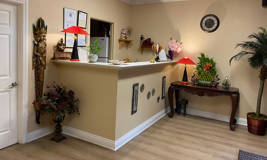 Image 5: One or Couples 60-Min Thai Massage with Optional Oil and Hot Stones 