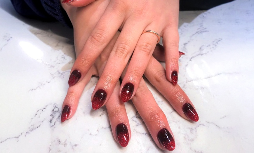 Image 3: Complete Nail Care with Mani-Pedi Services