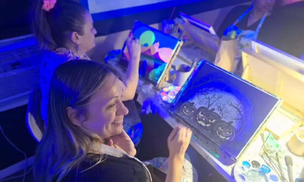 Up to 54% Off NEON Blacklight Paint & Sip at Oblivion Art House