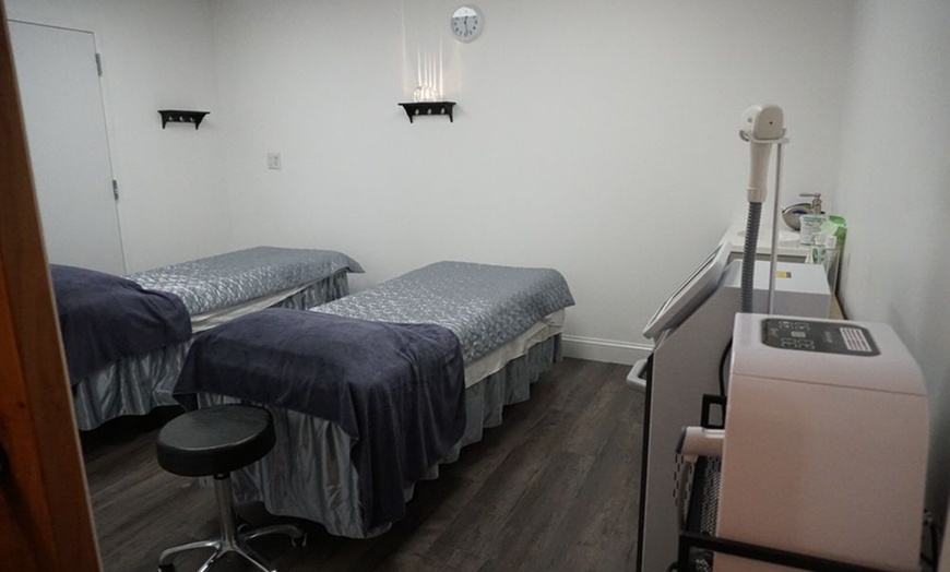 Image 3: Massage with Hot Stones for One or Couples at M&C Relaxation Spa