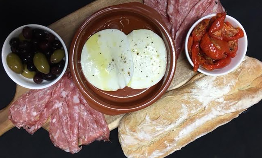 Image 2: Pizza and Platter with bottle of wine