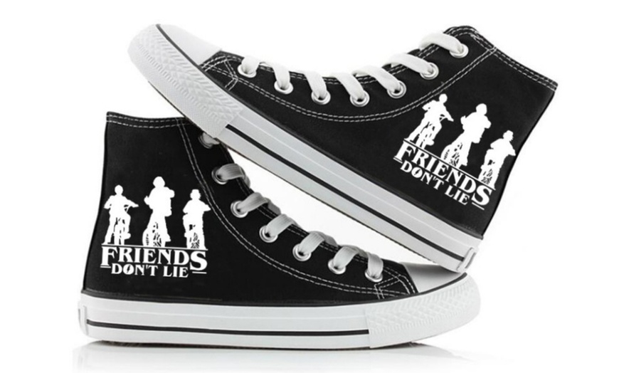 Image 8: Stranger Things Inspired Glow-in-the-Dark High-Top Trainers