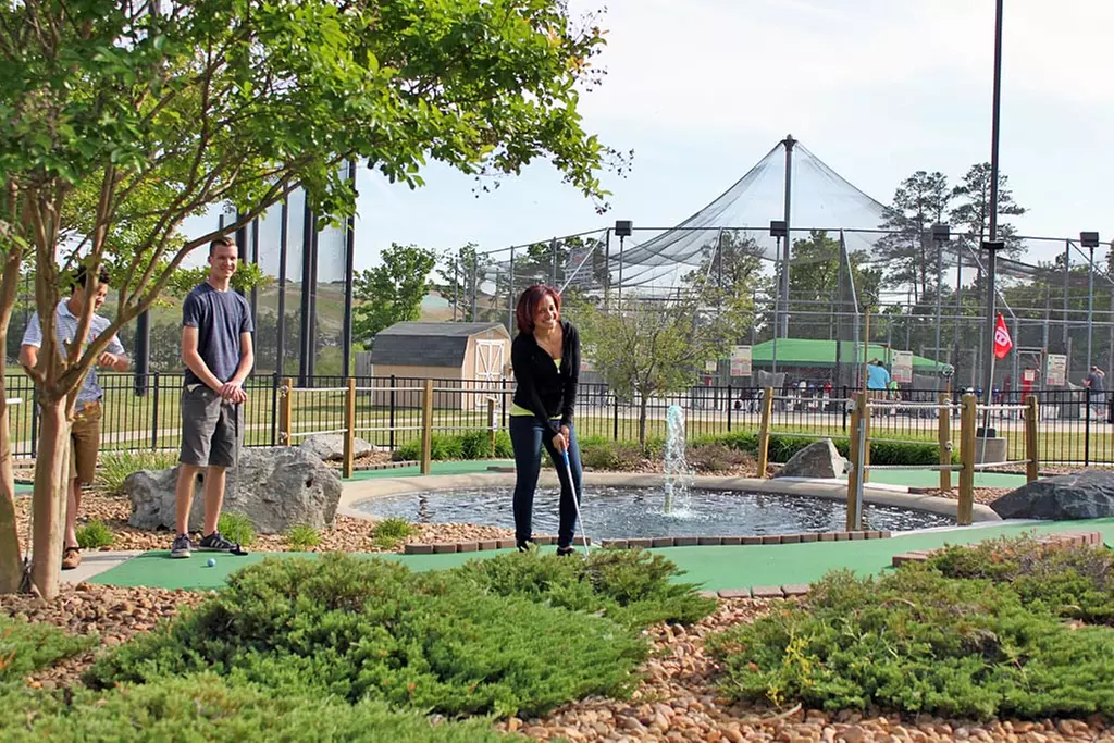 18-Hole Mini Golf, Driving Range Buckets, or Toptracer Session