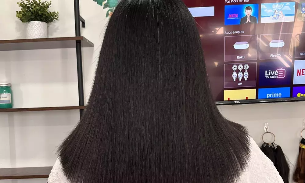 Get Sleek Hair with Shampoo, Deep Condition, Protein Treatment, Flat Iron and Optional Curls ( Up to 48% Off ) - Primary Image
