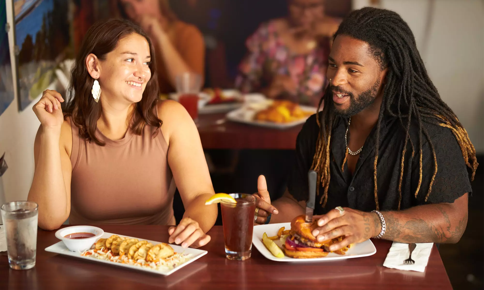 Savor 1 Appetizer and 1 or 2 Entrees at Paradise Lounge & Bar (Up to 45% Off) - Primary Image