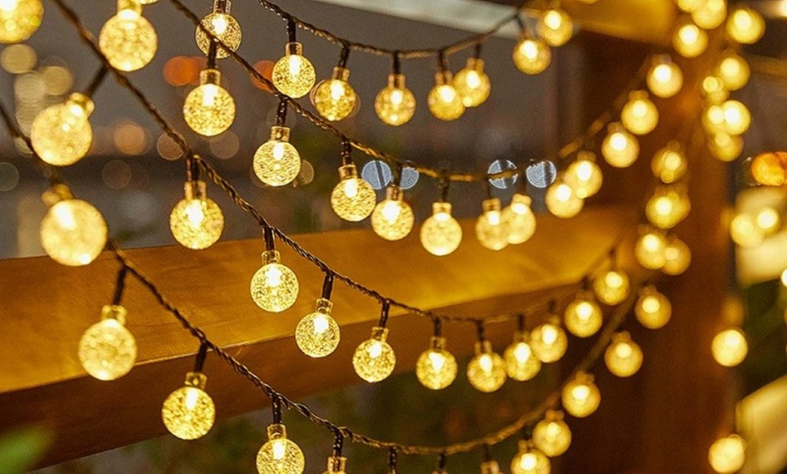 Image 1: Up to 50-Pack Solar-Powered Ball String Lights 