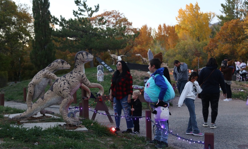 Image 1: Admission to the Annual Dinos in the Dark Halloween Event; For All Age