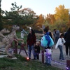Image 1: Admission to the Annual Dinos in the Dark Halloween Event; For All Age