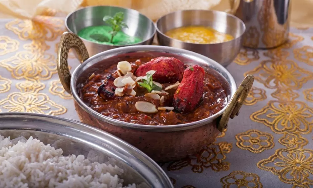 Three Course Indian Meal with Bottle of Wine for Two or Four People