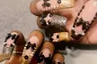 Basic or Deluxe Manicure & Pedicure / Medium or Long Basic Full Set- Acrylic, Polygel, and More (Up to 41% Off) - Second Medium