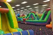 Enjoy 2 Hour Open Play Pass with Indoor Inflatable Fun or Immersive Virtual Reality Rides! - Second Medium