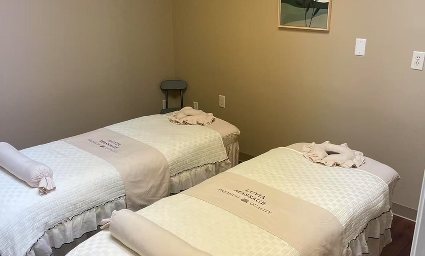 Image 7: Massages for 1 or 2 with Hot Towels, Organic Massage Oil and Lemon Tea
