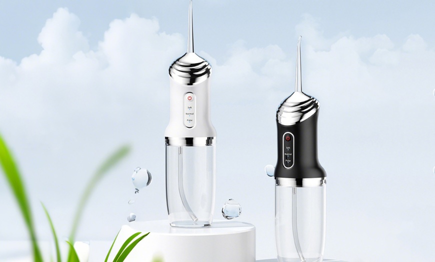Image 11: Three Modes Electric Cordless Water Flosser for Teeth
