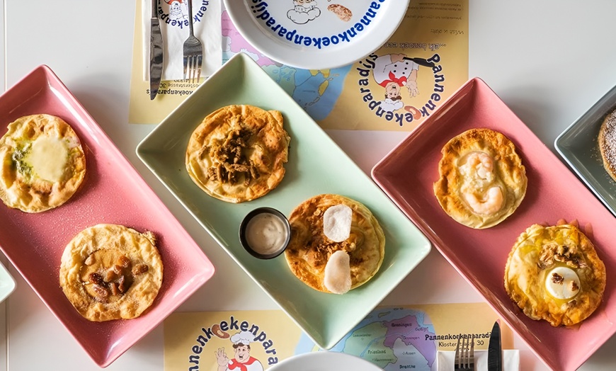 Image 4: Knapperige kipschnitzels in een knus pannenkoekenhuis