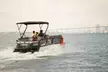 Experience One or Two Hour  Doo Switch Pontoon Boat Rental For Up to Seven (Up to 4% Off) at R&R Surf Rentals - Second Medium