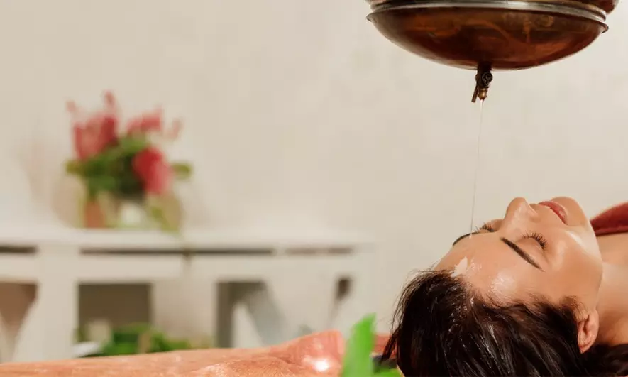 Delve into Peace with Ayurvedic Shirodhara Body Treatment for Women