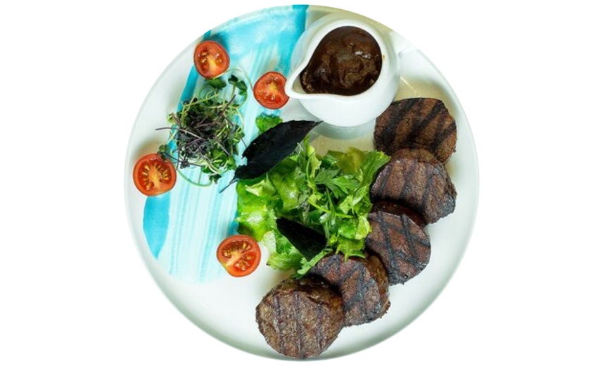 Image 3: Global Flavor Adventure – $10, $25, or $50 Toward Food & Drinks