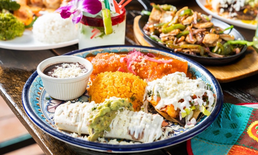 Image 20: Vibrant Rooftop Dining: Choose Meals, Margaritas, or Dining Credit