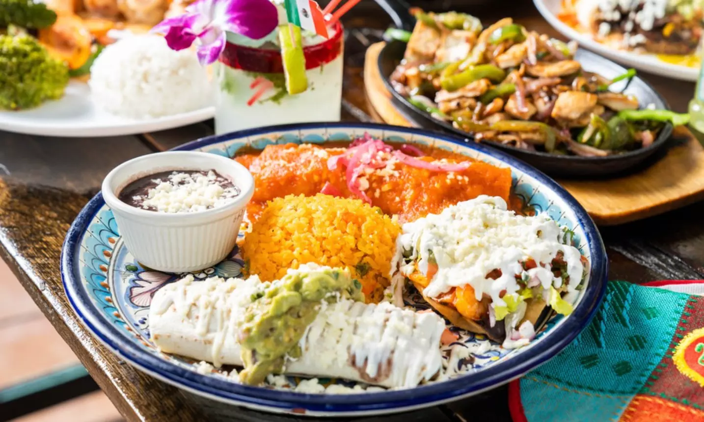 Vibrant Rooftop Dining: Choose Meals, Margaritas, or Dining Credit