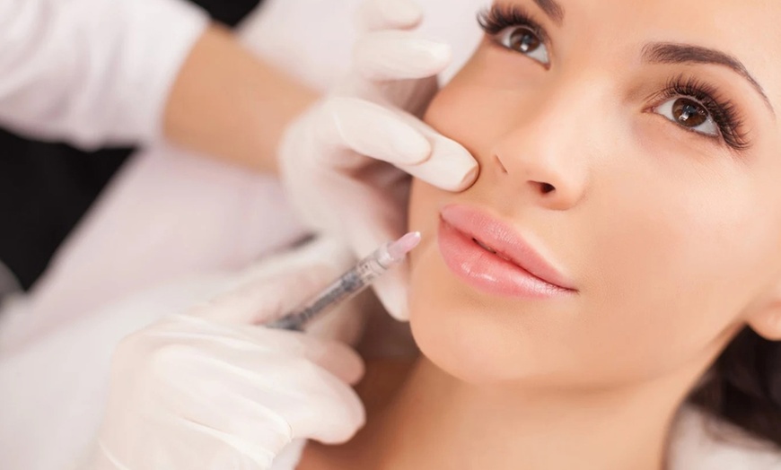 Image 1: Revitalize with 0.5ml, 1ml, or 2ml Dermal Filler Treatment on One Area