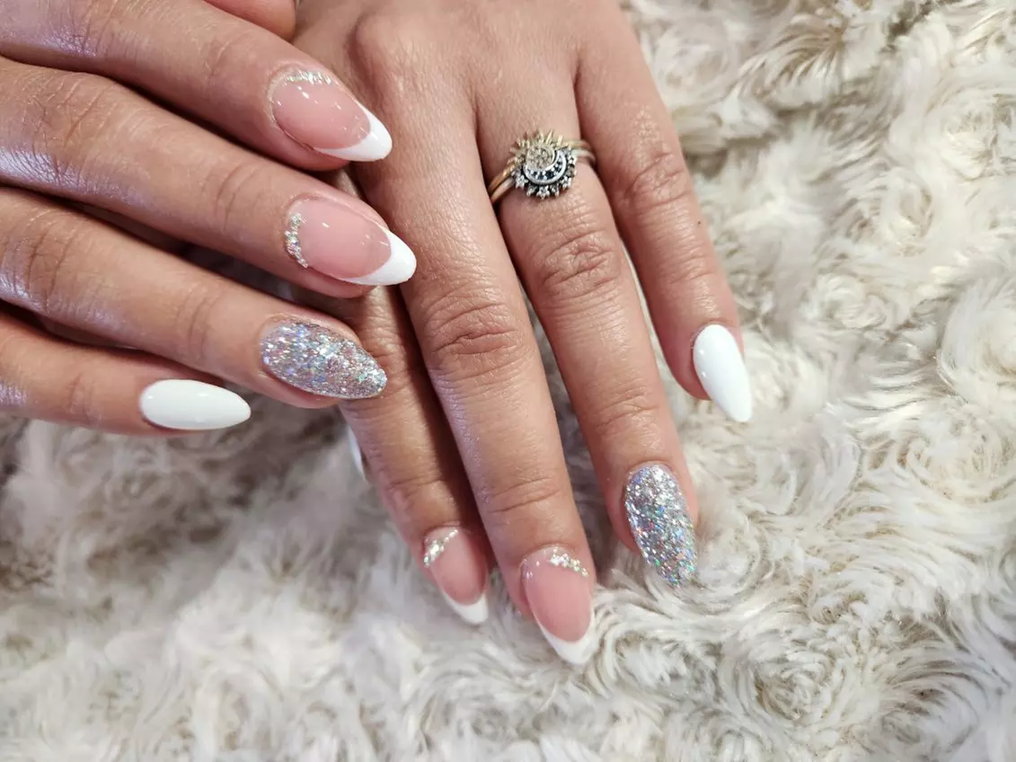 Classic Manicure, Classic Pedicure, Gel Manicure, or Mani-Pedi Combo
