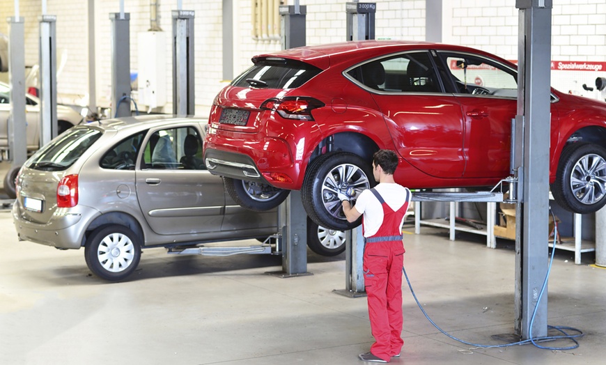 Image 1: Up to 78% Off on Tire Rotation at Car Club Tire & Auto Repair Service
