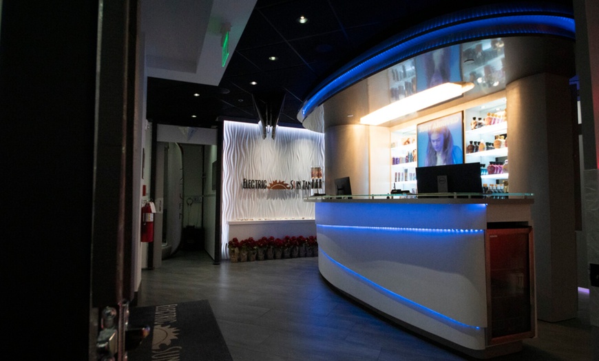 Image 8: Choose from "The Grand Tour" Tanning Bed or VersaSpa Spray Tan