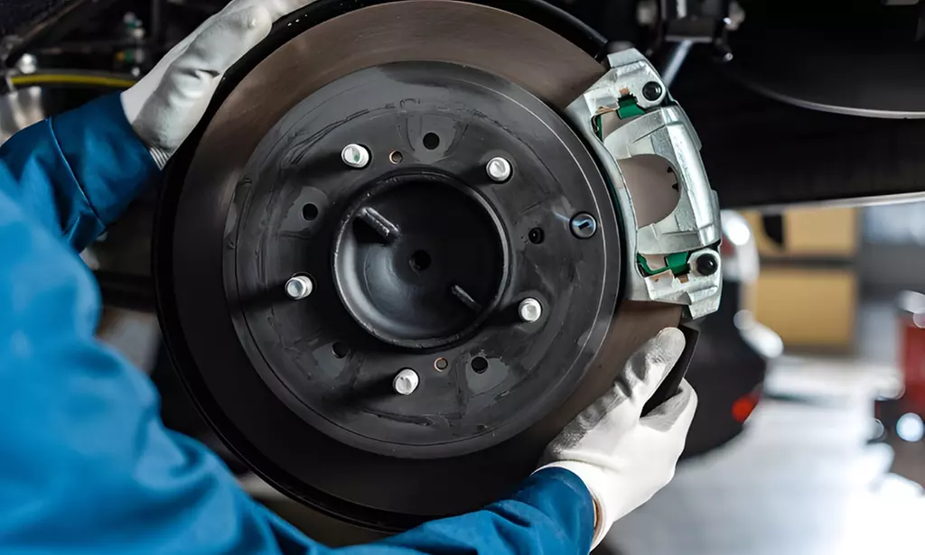 Front & Back Brake Pad or Rotor Replacement at Metal Garage (Up To 35% Off)