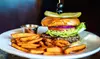 Enjoy $100 Towards Food & Drink or Date Night Dinner w/ a Bottle of Wine at The Alley Restaurant (Up To 35% Off)