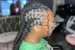 Small, Medium / Large Knotless Braid Session Or Men's Deluxe Hair Braiding at Tu Est Beaute Bar (Up to 50% Off) - Second Medium