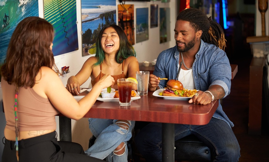 Image 2: Enjoy Appetizers and Entrees with Drinks at Paradise Lounge