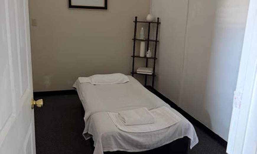 Image 6: Massages for 1 or 2 with Aromatherapy and Optional Hot Stones 