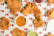 $25 or $50 Towards Food and Drink or Full/Half Sandwich + Chips or Fries & More @ Schnitzi (Up to  27% Off) - Second Medium