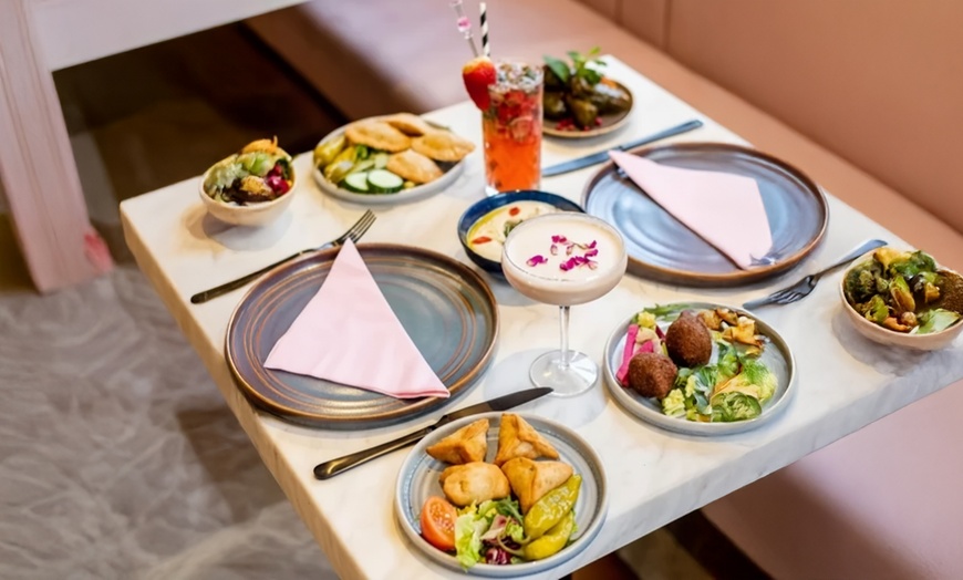 Image 1: Savor a Mezze Platter for Two or Four with Optional Glass of Wine