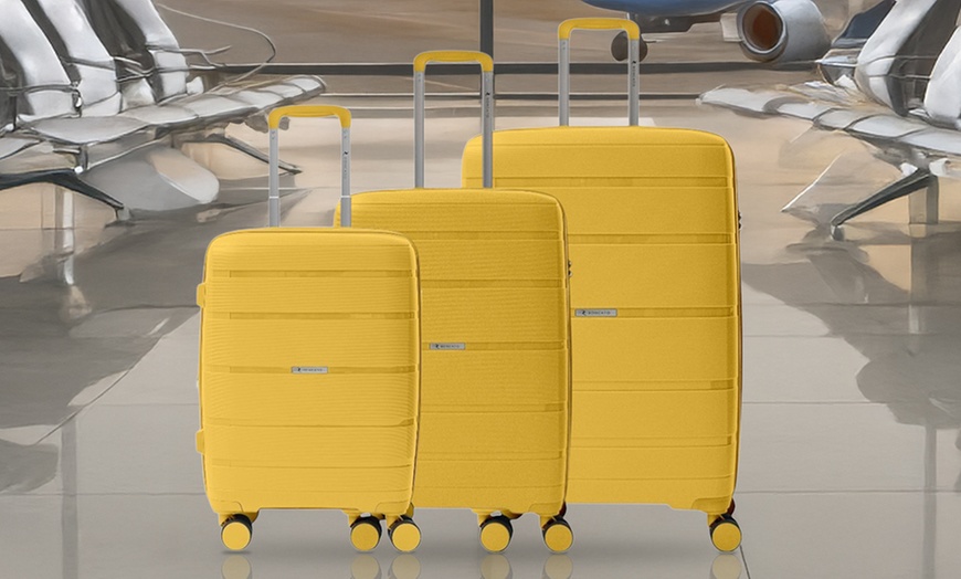 Image 1: Maleta o juego de maletas rígidas con ruedas y cierre TSA, de Roncato