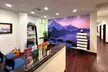 60 or 90-Minute Massage with Laser Therapy or Spinal Decompression Session and Consultation ( Up to 61% Off ) - Second Medium