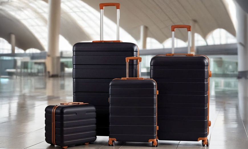 Image 2: Living And Home 4-Piece ABS Suitcase Set with Password Lock