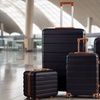 Image 2: Living And Home 4-Piece ABS Suitcase Set with Password Lock