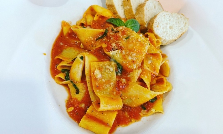 Image 2: Delicious Pasta with Flavorful Meatballs & Fresh Salads for Sharing
