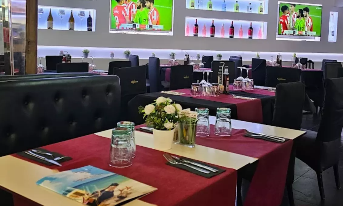 Festín mediterráneo: menú de paella con opción a botella de vino